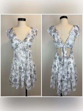 Feminine White Dress with Delicate Black Lined Detail Flattering Waistline